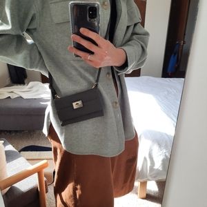 Roots mini crossover purse